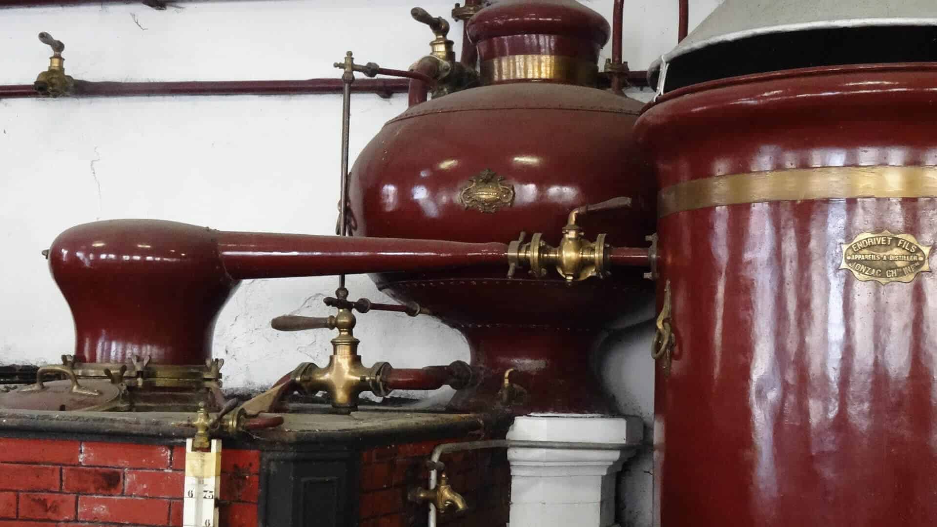 Old wood-fired still with a Moorish shape head capital for cognac