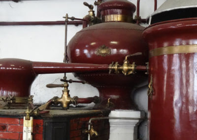 Old wood-fired still with a Moorish shape head capital for cognac