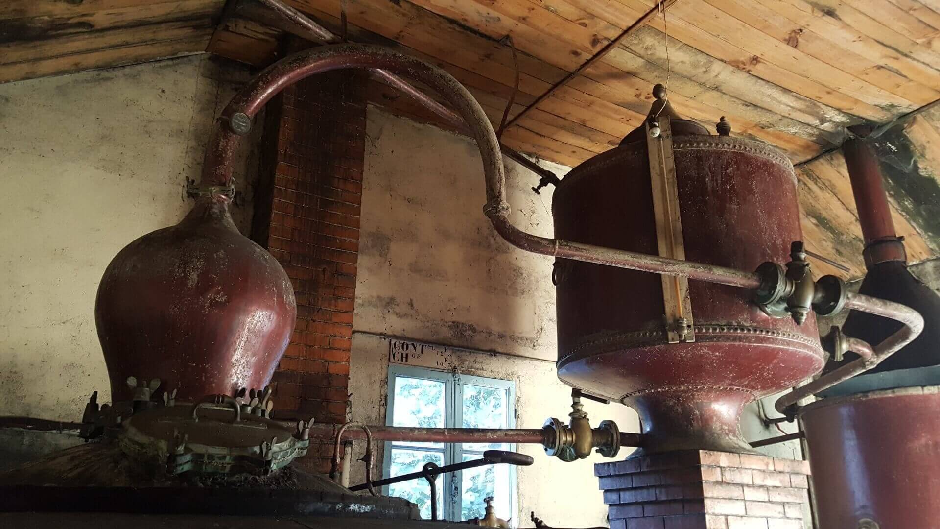 An old cognac distillery with its century-old still